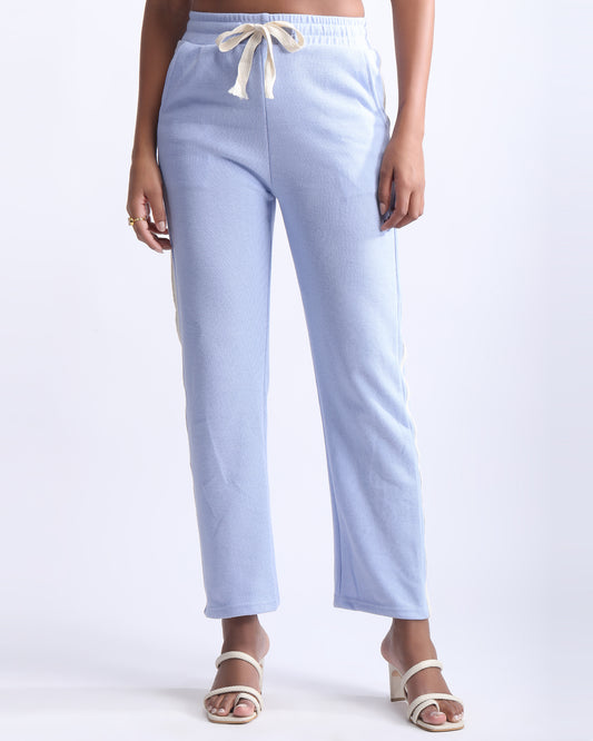 HIGH RISE LOUNGE TROUSER,blue, bottomwear, full length, high rise, knitted, lace, loungewear, relaxed fit, ribbed, trousers, wide leg,high-rise-lounge-trouser-blue,Color- Blue  
Fit- Straight Fit 
Length- Full 
Waist- High Rise 
Closure- Elasticated 
No. of Pockets- 2 
Fabric- Ribbed  
Print/ Pattern- Solid 
Details/Design Elements- Laced