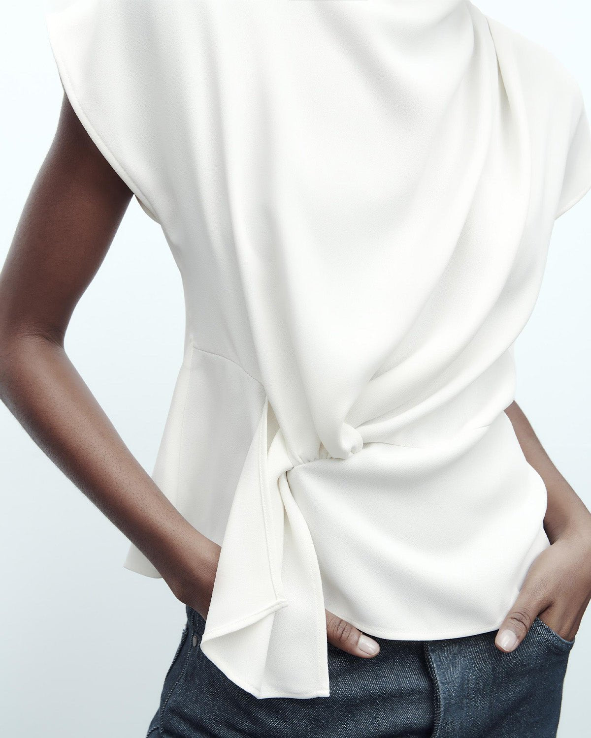 FRONT KNOT REGULAR FIT TOP,casual, drop shoulder, georgette, high neck, regular, relaxed fit, short sleeves, soft girl, solid, summer, tie knot, tops, topwear, white, woven,regular-fit-front-knot-white-top,Neck - High neck Sleeve - Drop sleeve Fit - Regular fit Print/Pattern - Solid Color - White Material - Polyester  Detail - Front side knot detailing