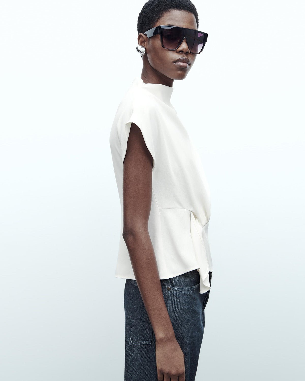 FRONT KNOT REGULAR FIT TOP,casual, drop shoulder, georgette, high neck, regular, relaxed fit, short sleeves, soft girl, solid, summer, tie knot, tops, topwear, white, woven,regular-fit-front-knot-white-top,Neck - High neck Sleeve - Drop sleeve Fit - Regular fit Print/Pattern - Solid Color - White Material - Polyester  Detail - Front side knot detailing