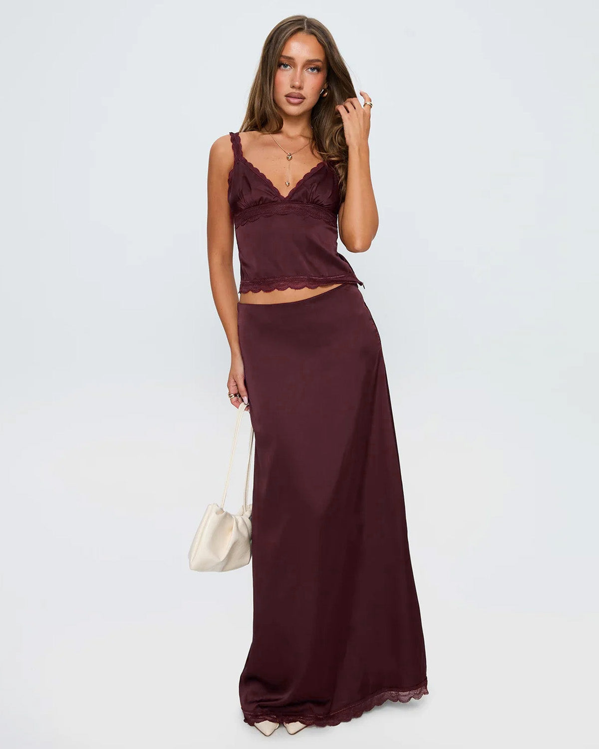 coord sets,bottomwear, topwear,casual chic, vacation, outdoor events, minimal, summer, urban fit, bold, ,knitted,woven,maroon,solid,laced,laced,slim fit top,fitted top,waist length top,scalloped hem,cami neck,adjustable straps,no sleeves,no sleeves,slip on,skirts,straight skirt,full length,straight hem,mid rise waist,no pockets,OY3063, 25070032GG