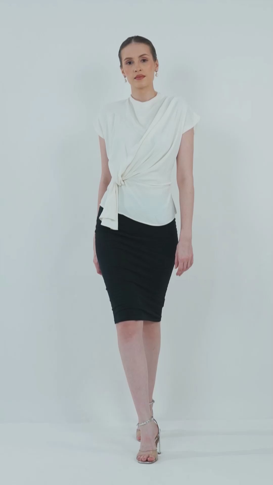 FRONT KNOT REGULAR FIT TOP,casual, drop shoulder, georgette, high neck, regular, relaxed fit, short sleeves, soft girl, solid, summer, tie knot, tops, topwear, white, woven,regular-fit-front-knot-white-top,Neck - High neck Sleeve - Drop sleeve Fit - Regular fit Print/Pattern - Solid Color - White Material - Polyester  Detail - Front side knot detailing