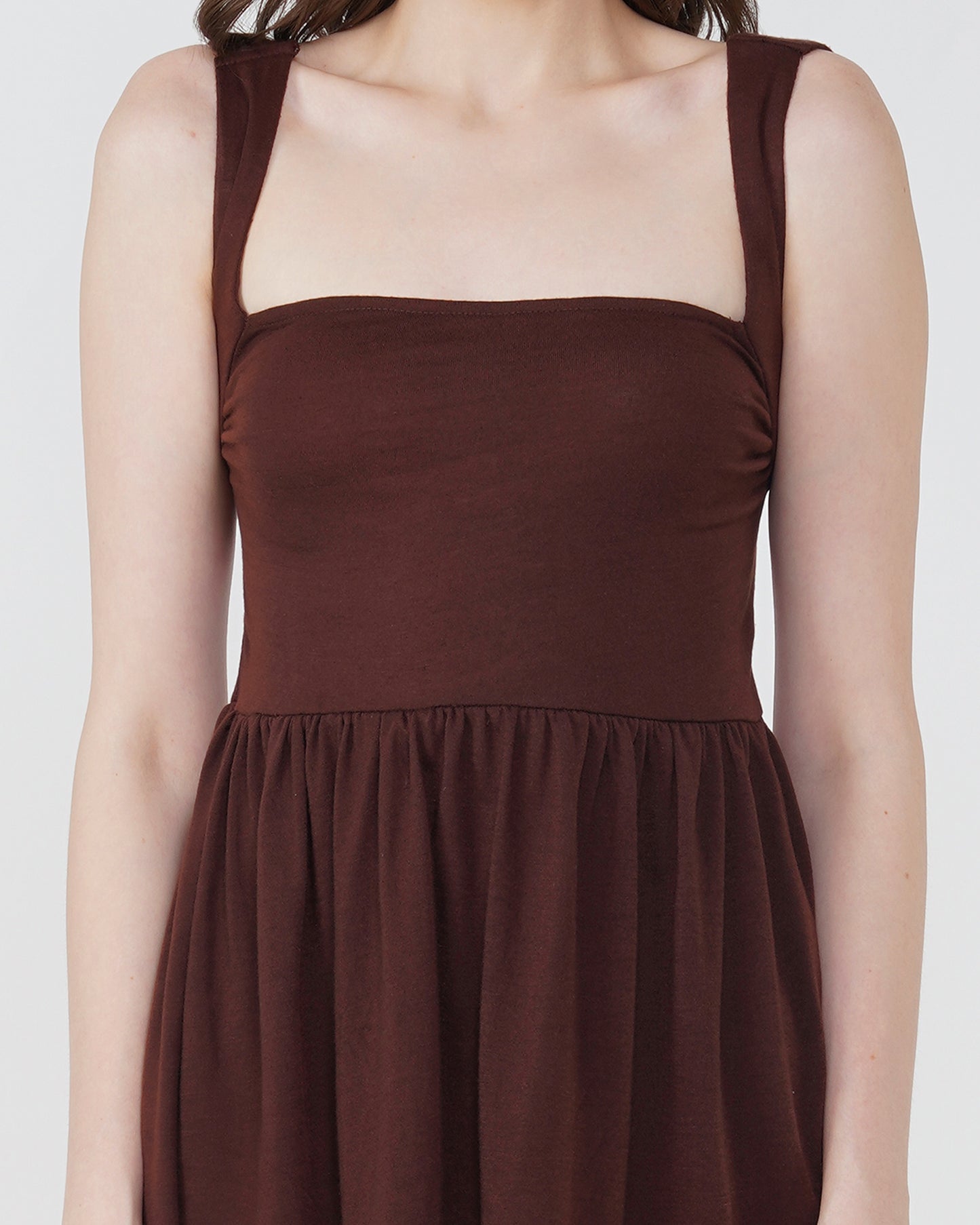 gathered-fit-and-flare-dress-brown,GATHERED FIT AND FLARE DRESS,dresses,dresses,outdoor event,streetwear,knitted,single jersey,brown,solid,gathered,skinny fit,fit and flare,mini,square neck,shoulder strap,sleeveless,cutout back