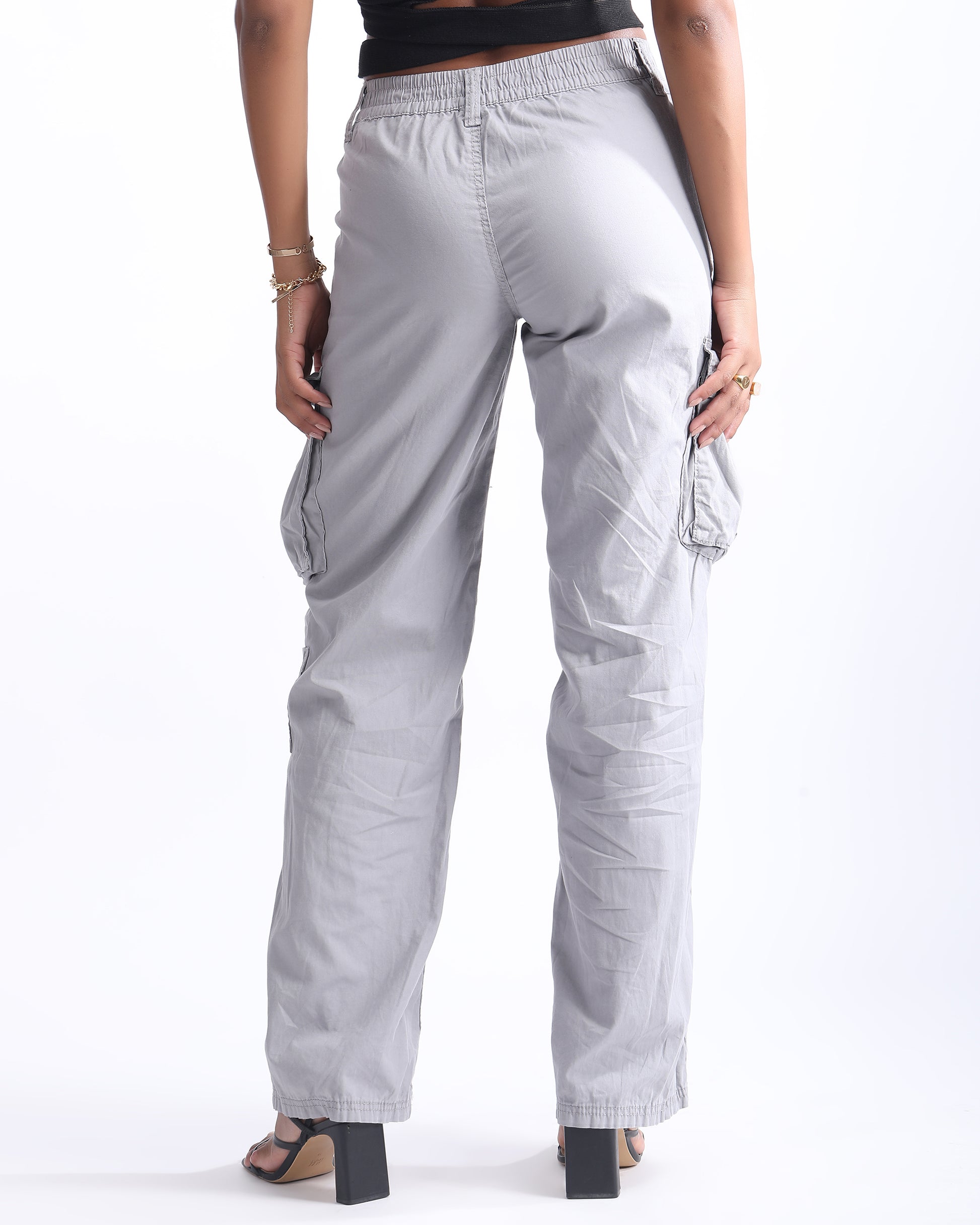 MID RISE STRAIGHT FIT CARGO,bestsellers cat2 april 24, bottomwear, cargos, cotton, grey, mid rise waist, trousers, utility pocket, wide leg,cargo-wide-leg-trouser-1-grey,Length - Full length Waist - Mid-rise waist Fit - Wide leg fit Color - GreyNo. of Pockets - 4Material - Cotton BlendClosure - Zip &amp; button