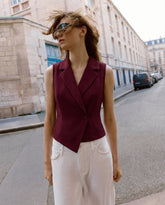 notch-collar-waist-coat-maroon,topwear,waist coat,semi-formal,creative workwear,woven,lycra, polyester,maroon,solid,tailored fit,regular,lapel collar,sleeveless,Color: Maroon
Fabric: Polyester, Lycra
Fit: Skinny Fit 
Length: Regular
Neck: Lapel Collar
Closure: Button
Print: Solid,NOTCH COLLAR WAIST COAT