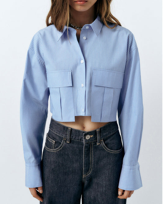 PINSTRIPE CROP SHIRT,blue, button, casual, collared, cotton, crop, long sleeves, oversized, patch pocket, pinstripe, printed, shirts, streetwear, stripes, topwear, utility pocket, woven,crop-relaxed-fit-stripes-blue-shirt,Neck - Shirt collar Sleeve - Long sleeves Fit - Relaxed fit Print/Pattern - Stripes Color - Blue and white Material - Poly cotton Detail - Front flap patch pockets