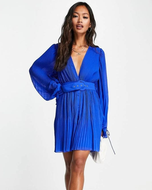 pleated-mini-dress-blue,PLEATED MINI DRESS,Color: Blue
Fabric: Georgette
Type: A-Line
Fit: Regular Fit
Length: Mini
Neck: Plunge Neckline
Sleeve: Bishop Sleeve
Closure: Button
Trims: Belt
Print: Solid
Details: Pleated Fabric,dresses,dresses,vacation,glam,woven,georgette,blue,solid,pleated,belt,regular fit,a line,mini,plunge neckline,bishop sleeves,long sleeves,deep back