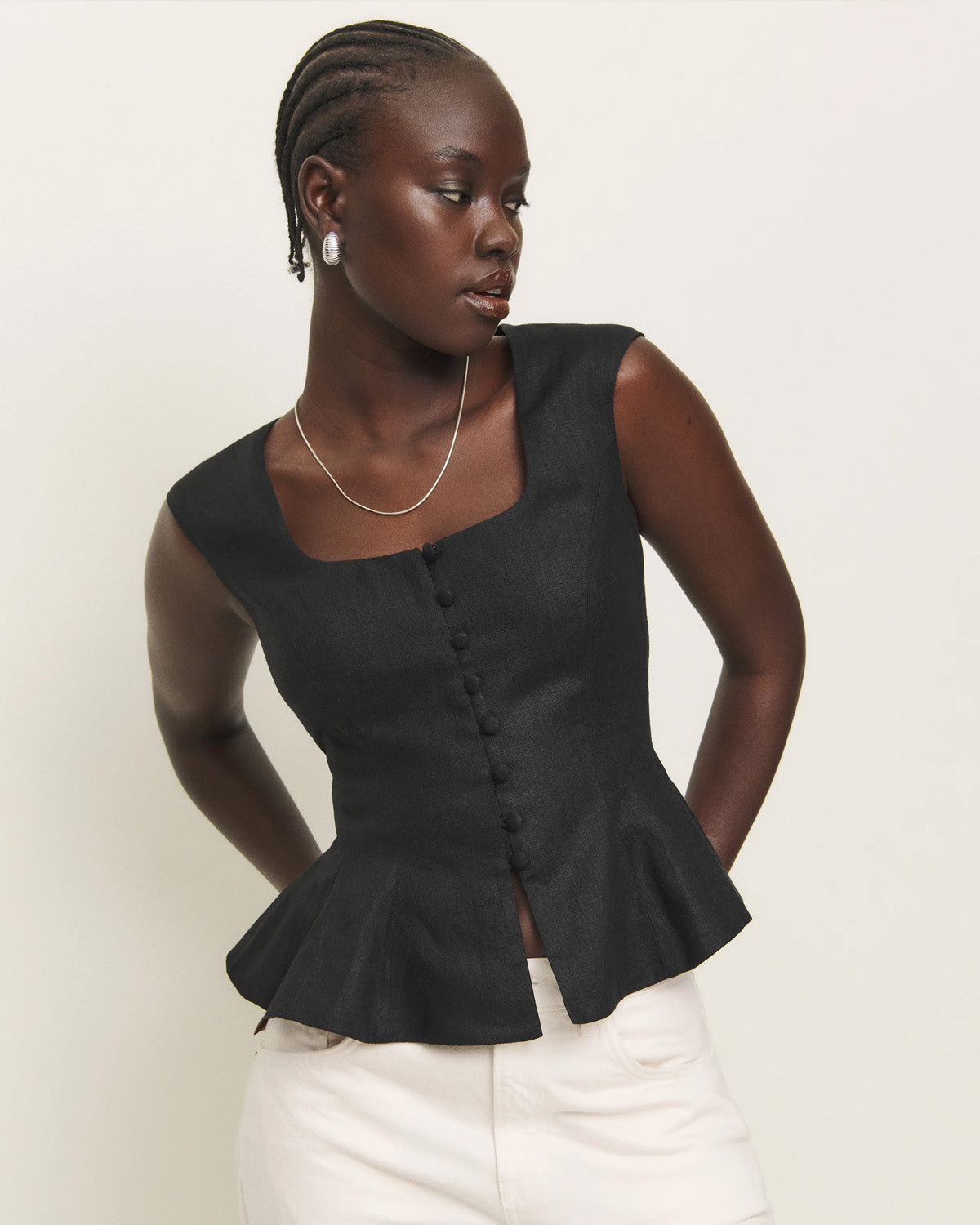 topwear,tops,semi-formal, vacation, outdoor events,minimal, sophisticated, summer,woven,cotton,black,solid,flounce,button,slim fit,peplum,waist length,flounce hem,square neck,shoulder strap,sleeveless, OY1909, 25060009GG