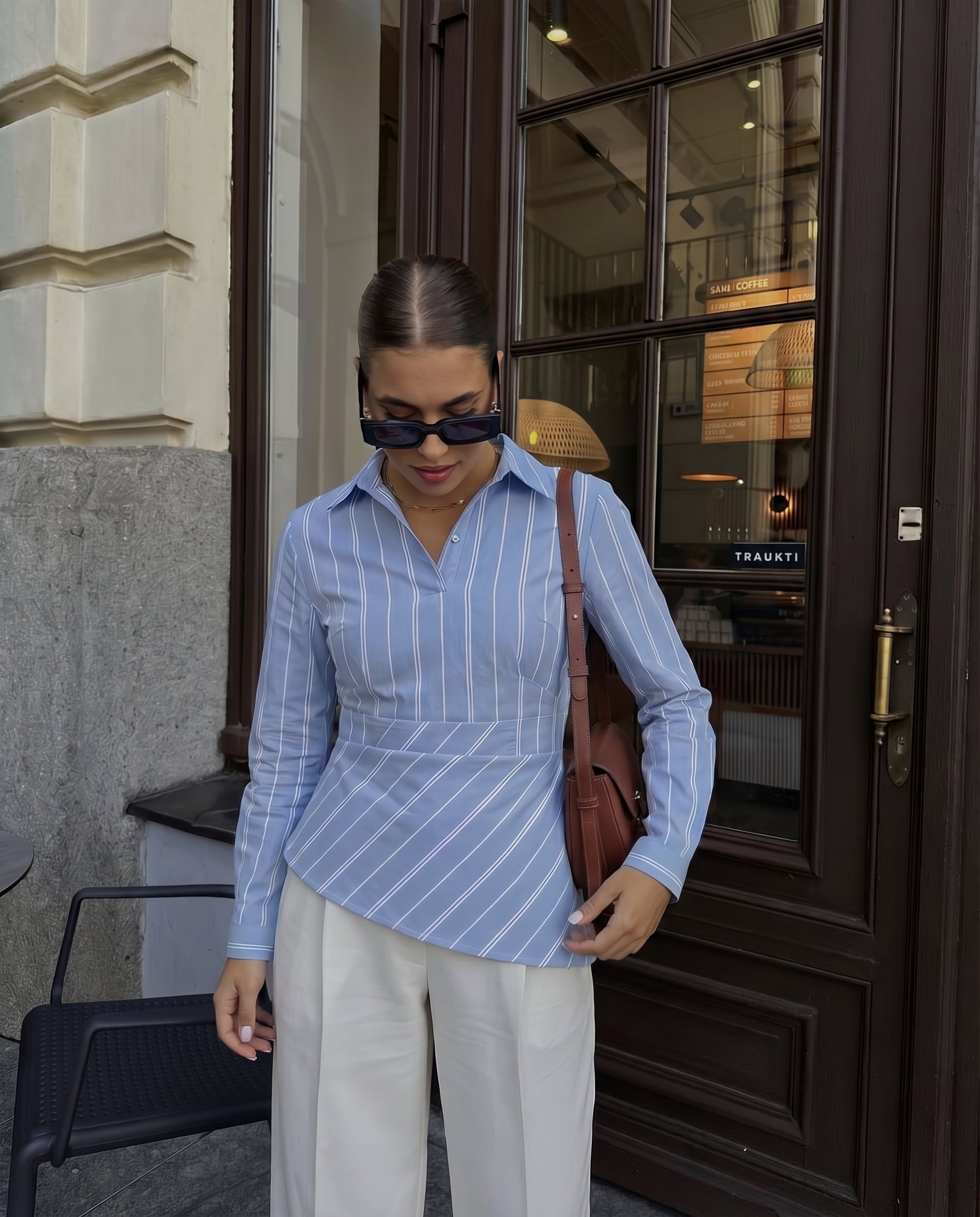 blue, asymmetrical shirt, summer, pastel blue, Stylish blue shirt, vertical stripes, playful, fun.