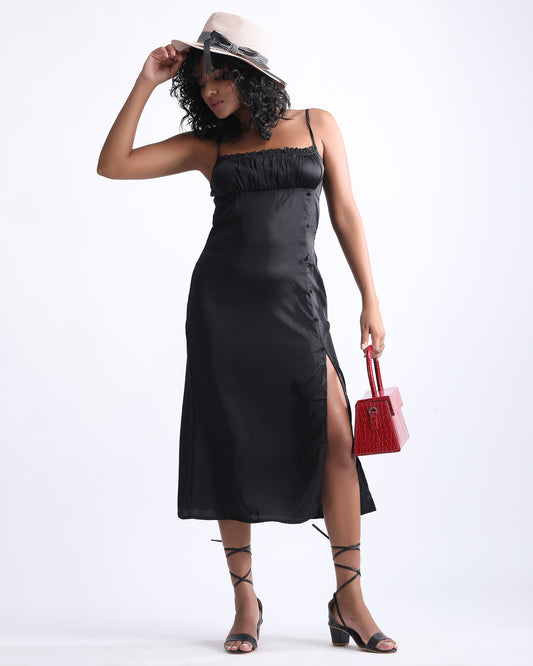 SATIN SLIT DRESS,adjustable strap, black, button, cami neck, dresses, glam, midi, party, satin, sleeveless, slim fit, slit, solid, straight, woven,satin-slit-dress-black,Color- Black
Sleeve- Sleeveless
Strap- Spaghetti Strap
Type- Slit Dress
Fit- Sheath
Print/Pattern- Solid
Length- Mini
Fabric- Satin
Closure- Zip
Detail- Ruched Bust