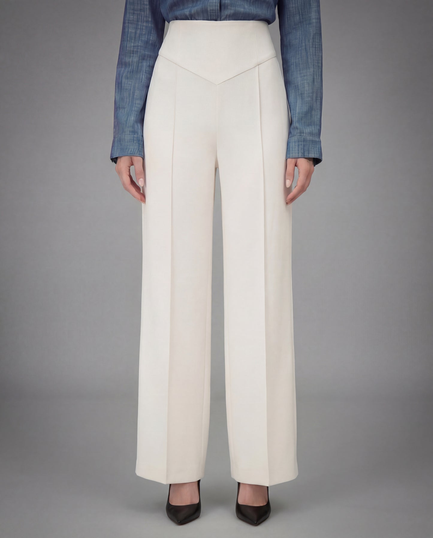 SCULPTED WAIST PLEATED TROUSERS,Color: White
Fabric: 95% poly 5% spandex
Fit: Tailored Fit
Length: Full Length(41")
Waist: High Rise 
Closure: Elasticated
No. of Pockets: 2
Print: Solid
Details: Corset shaped panel in front for a clinched waist look,pants,bottomwear,pants,semi-formal,business outfit,stretchable,polyester, spandex,white,pleated,tailored fit,wide leg,full length,high rise