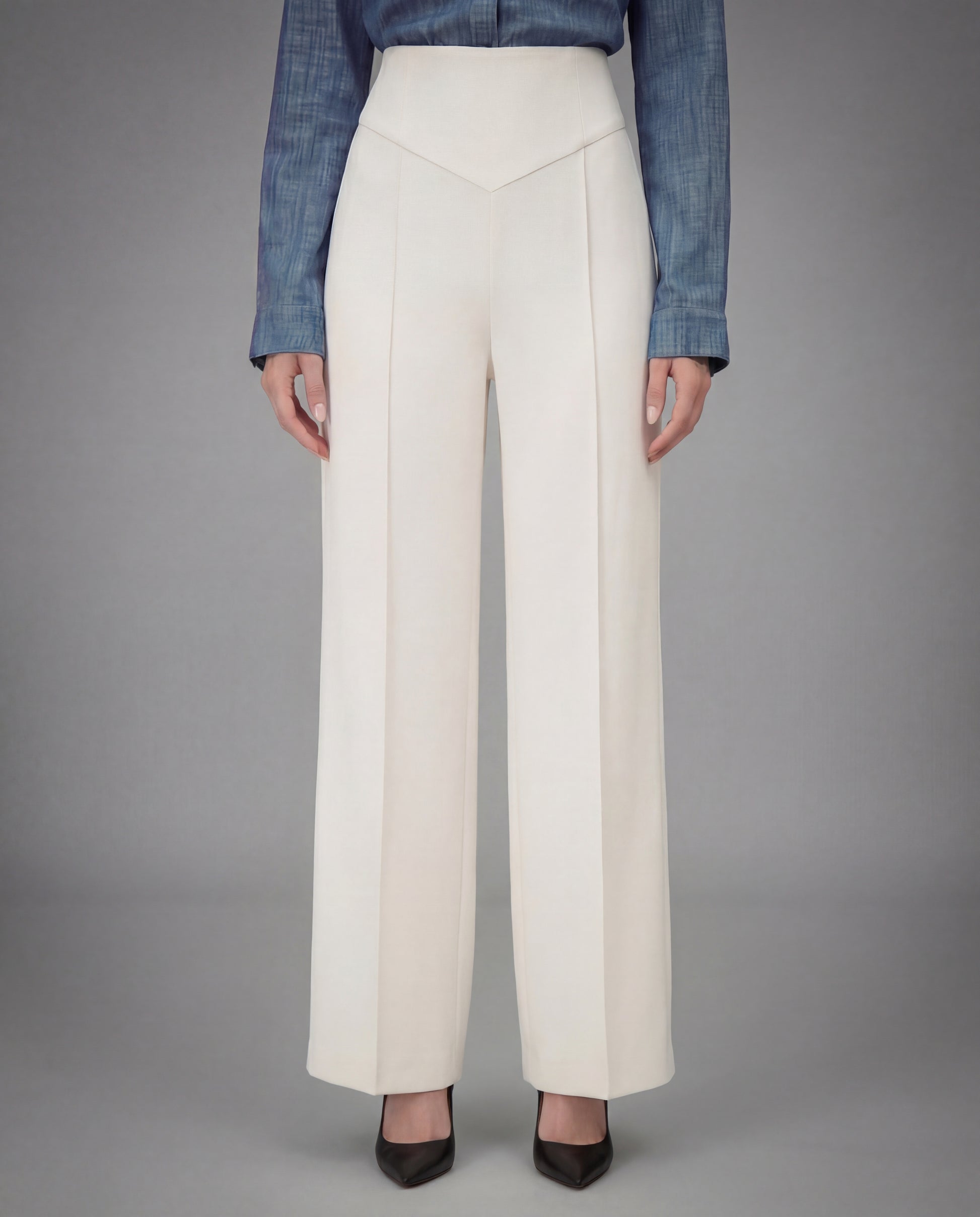 SCULPTED WAIST PLEATED TROUSERS,Color: White
Fabric: 95% poly 5% spandex
Fit: Tailored Fit
Length: Full Length(41")
Waist: High Rise 
Closure: Elasticated
No. of Pockets: 2
Print: Solid
Details: Corset shaped panel in front for a clinched waist look,pants,bottomwear,pants,semi-formal,business outfit,stretchable,polyester, spandex,white,pleated,tailored fit,wide leg,full length,high rise