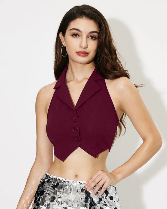 cropped-vest-top-maroon,topwear,tops,party,bold,woven,lycra, polyester,maroon,solid,tailored fit,vest,crop,lapel collar,sleeveless,Color: Maroon
Fabric: Polyester, Lycra 
Fit: Skinny Fit 
Length: Crop
Neck: Halter Neck
Closure: Button
Print: Solid,CROPPED VEST TOP