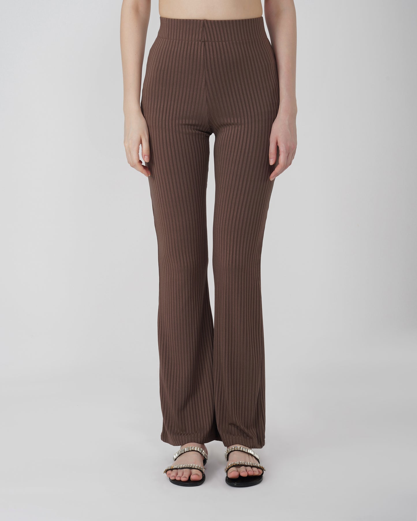 RIBBED FLARED TROUSER,Color: Chocolate Brown
Fabric: Ribbed 
Fit: Flared Fit 
Length: Full Length (43 inches)
Waist: High Rise
Print: Solid
Details: Ribbed Surface,bottomwear,trousers,casual,knitted,ribbed,chocolate brown,flared fit,flared,full length,flared,high rise,suited for influencer,ribbed-flared-trouser-chocolate-brown