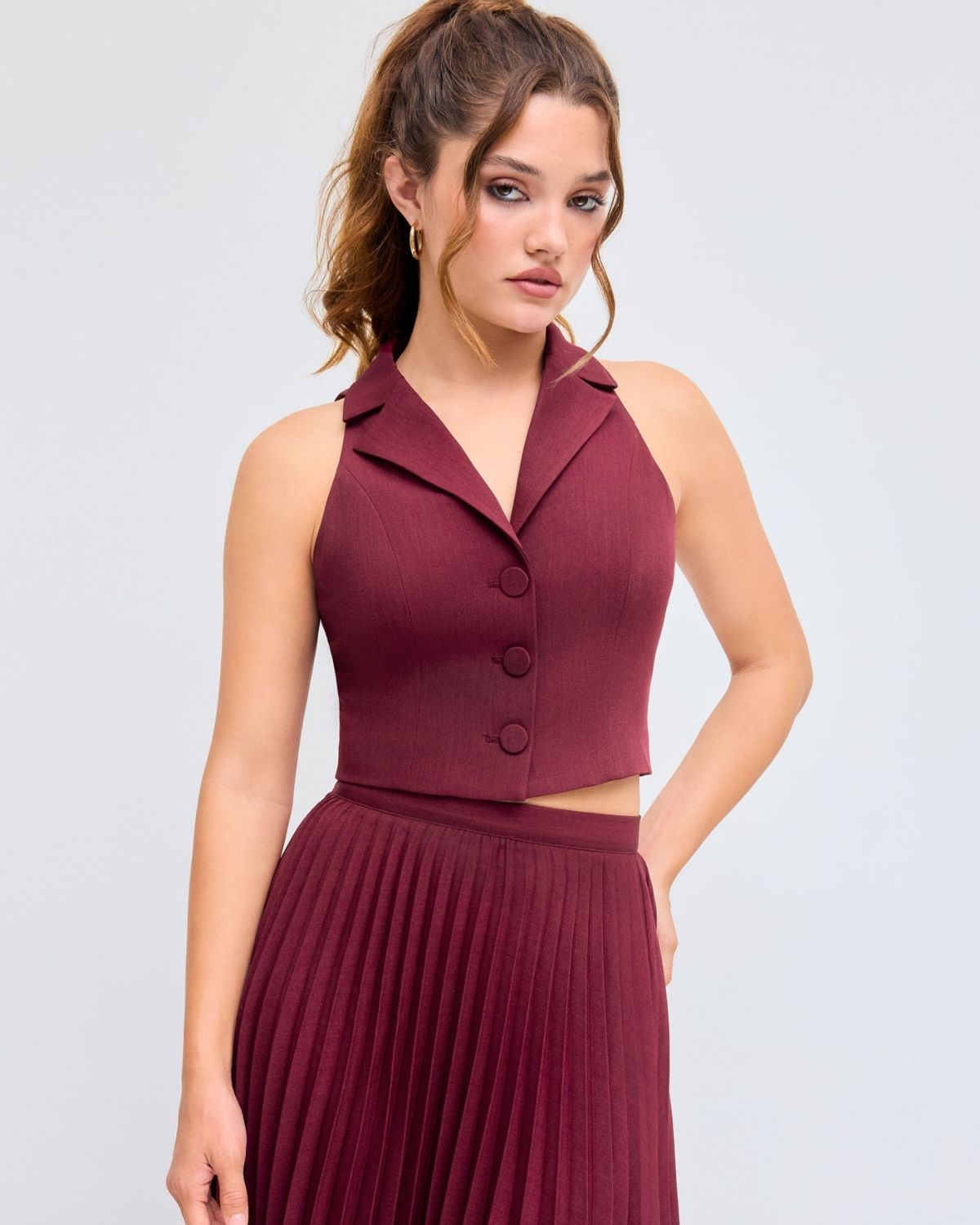 coord sets,bottomwear, topwear,casual chic, formal, semi-formal,minimal, sophisticated, summer, timeless,woven,satin,maroon,solid,pleated,button, zipper,tailored fit top,vest,waist length top,straight hem,lapel collar,no straps,no sleeves,sleeveless,button down top,skirts,pleated skirt,midi skirt,straight hem,mid rise waist,no pockets OY3044, 25070017GG