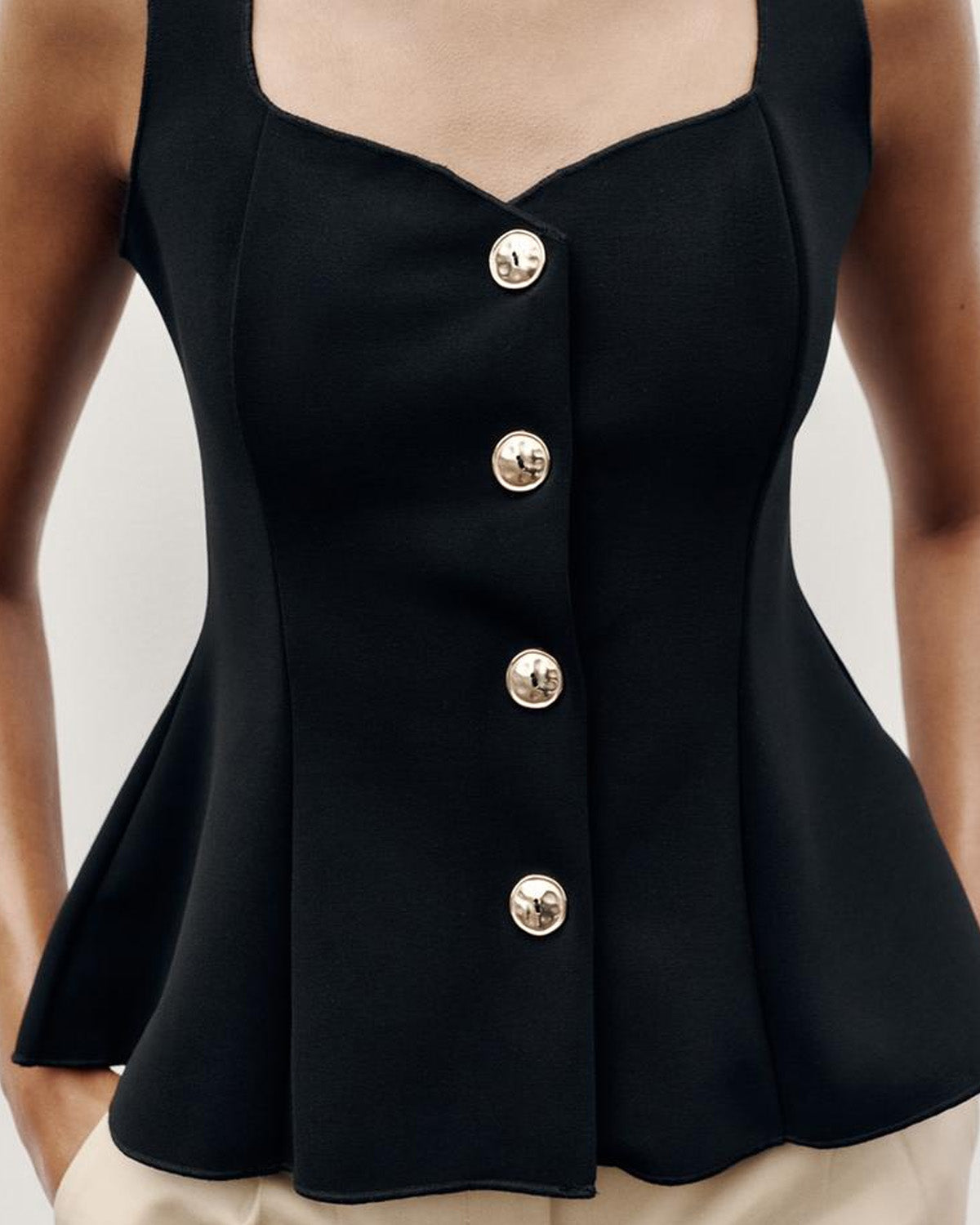 topwear,tops,semi-formal,statement piece,knitted,polyester, spandex,black,solid,panelling,button, golden trims,slim fit,vest,waist length,flounce hem,diamond neck,shoulder strap,no sleeves,sleeveless, OY2177, 25090044GG