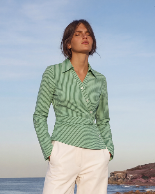 Women’s green striped wrap style summer everyday wear shirt with structured silhouette, long sleeves and stylish vertical stripes