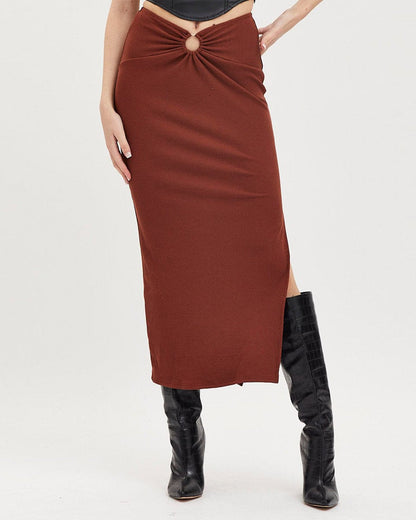 ribbed-slit-ring-detail-slit-skirt-brown-oy1514,25010014GG72,bottomwear,skirts,party,glam, streetwear,knitted,ribbed,brown,skinny fit,slit,midi,mid rise,Color: Brown
Fabric: Ribbed
Fit: Slim Fit
Type: Slit Skirt
Length: Midi
Waist: Mid Rise
Closure: Elasticated
Print: Solid
Detail: Ring in the centre front gives a snatched waist look.,RIBBED SLIT RING DETAIL SLIT SKIRT