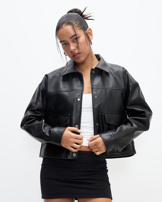 button-down-faux-leather-shacket-black,outer wear,jackets,outdoors,streetwear, winter wear,non woven,faux leather,black,solid,panelling,snap button,boxy fit,shackets,regular,spread collar,long sleeves,flap pocket,Color: Black
Fabric: Faux Leather
Fit: Boxy Fit
Length: 20 inch
Neck: Spread Collar
Closure: Snap Button
Type of Pocket: Flap Pocket,BUTTON DOWN FAUX LEATHER SHACKET