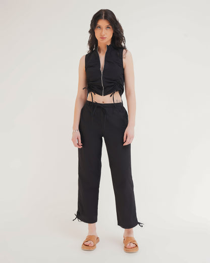 RUCHED COORD SET - TROUSERS,ankle length, black, bottomwear, casual, coord sets, cotton, drawstring, high rise, pants, relaxed fit, ruched, streetwear, summer, wide leg, woven,wide-leg-ruched-pants-black,Color- BlackFabric- CottonType- Wide LegFit- Relaxed Fit Length- Ankle LengthWaist- High RiseClosure- Zip &amp; ButtonNo. of Pockets- 2Detail- Drawstring Hem
Contains only Pants