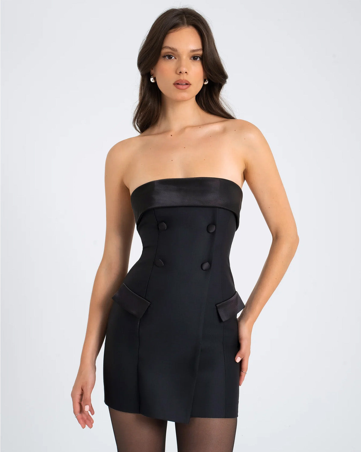 dresses,dresses,date night, semi-formal, statement,bold, glam,knitted,lycra, satin,black,solid,button,slim fit,bandeau,mini,off shoulder neck,sleeveless,Color: Black
Fabric: Satin, Lycra
Type: Bandeau Dress
Fit: Slim Fit
Length: Mini
Neck: Off Shoulder Neck
Closure: Zipper
Print: Solid
Details: The front overlap detailing lends the dress a tuxedo-inspired aesthetic.,TUXEDO INSPIRED BANDEAU DRESS IN BLACK,tuxedo-inspired-bandeau-dress-in-black-black-oy1221