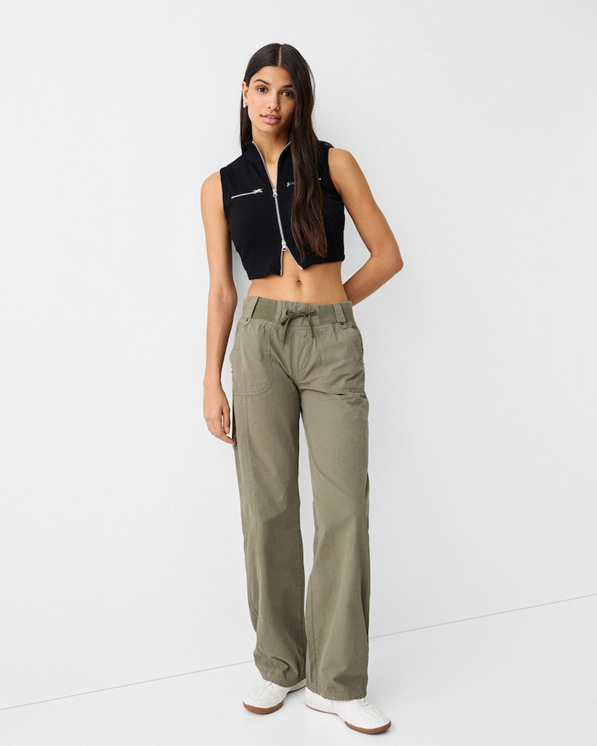 bottomwear,trousers,casual,streetwear,woven,cotton,olive,patch pocket,straight fit,straight,full length,mid rise,ribbed-waist-straight-fit-trouser-olive,Color: Olive
Fabric: Cotton
Fit: Straight Fit 
Length: Full Length
Waist: Mid Rise
Closure: Drawstring
No. of Pockets: 4
Print: Solid
Details: Features a high-rise elastic waistband with an adjustable drawstring for a comfortable, customizable fit.,RIBBED WAIST STRAIGHT FIT TROUSER