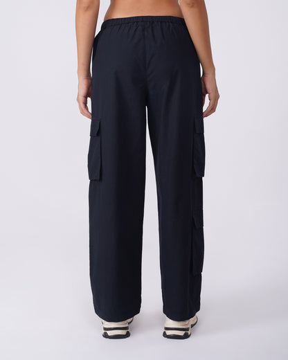 utility-pocket-parachute-pants-black,UTILITY-POCKET PARACHUTE PANTS,Color: BlackFabric: Cotton PoplinFit: Relaxed Fit Length: Full Length (39 in)Waist: Mid RiseClosure: Elasticated with drawstringNo. of Pockets: 5Print: SolidDetail: Flap pockets on sides,coord sets,parachutes,casual,streetwear,woven,cotton, poplin,black,flap pocket, utility pocket,relaxed fit,full length,drawstring,mid rise,Manufacturing batch1_June19