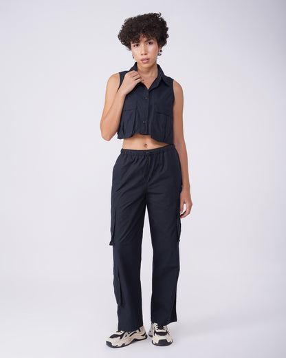 flap-pocket-co-ord-crop-shirt-black,FLAP POCKET CO-ORD CROP SHIRT,Color: BlackFabric: Cotton, PoplinFit: Regular Fit Length: CropNeck: CollaredSleeves: SleevelessClosure: Button-UpPrint: SolidDetails: Flap-Pocket,coord sets,tops,casual,streetwear,woven,cotton, poplin,black,solid,flap pocket, utility pocket,regular fit,crop,crop,collared,sleeveless,Manufacturing batch1_June19