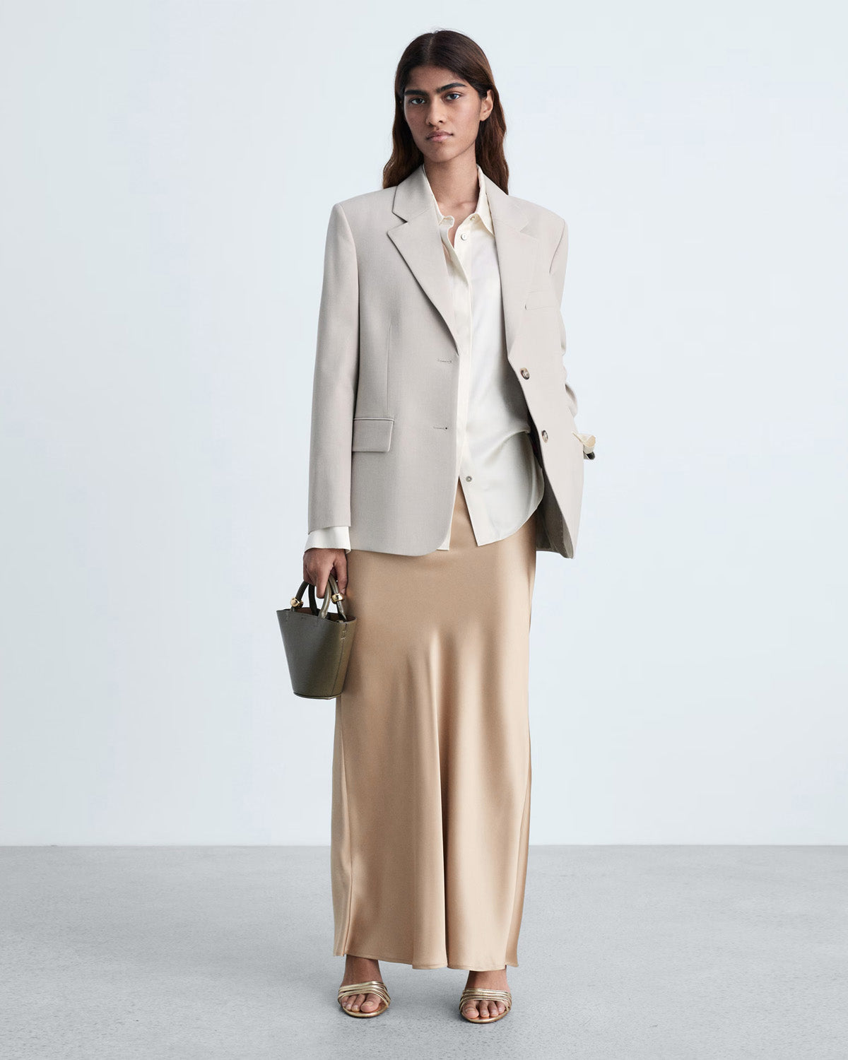 bottomwear,skirts,casual chic, outdoor events, party,glam, summer, urban fit, vintage,woven,satin,beige,zipper,skinny fit,a-line skirt,maxi,a-line,mid rise	25070011GG, OY2084