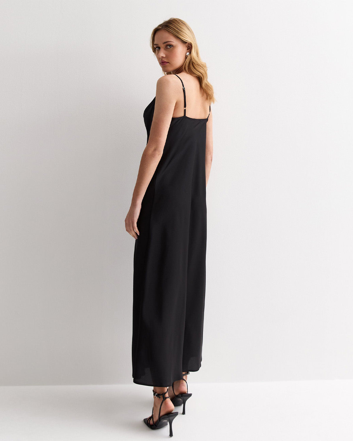 dresses,dresses,date night, party, statement, vacation,bold, glam, summer,woven,satin,black,solid,regular fit,slip,maxi,cami neck,spaghetti strap,sleeveless,Color: Black
Fabric: Satin
Type: Slip Dress
Fit: Relaxed Fit
Length: Maxi
Neck: Cami Neck
Strap: Spaghetti Strap
Print: Solid,SATIN MAXI SLIP DRESS IN BLACK,satin-maxi-slip-dress-in-black-black-oy1214