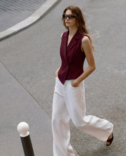 notch-collar-waist-coat-maroon,topwear,waist coat,semi-formal,creative workwear,woven,lycra, polyester,maroon,solid,tailored fit,regular,lapel collar,sleeveless,Color: Maroon
Fabric: Polyester, Lycra
Fit: Skinny Fit 
Length: Regular
Neck: Lapel Collar
Closure: Button
Print: Solid,NOTCH COLLAR WAIST COAT