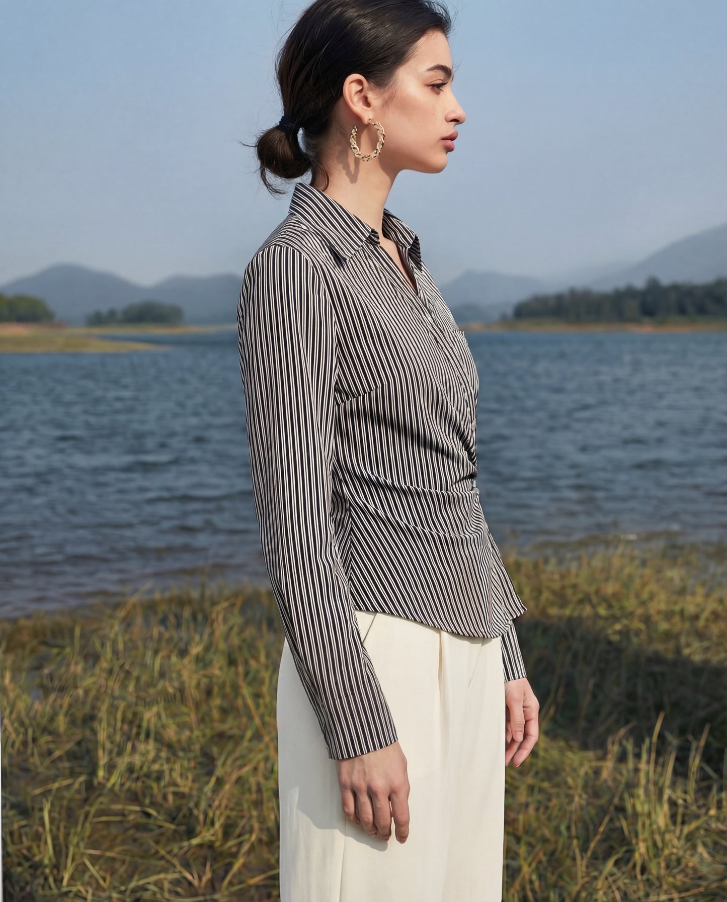 Black pinstripe shirt for women's office wear with tailored fit and breathable fabric, effortless styling for full day comfort
