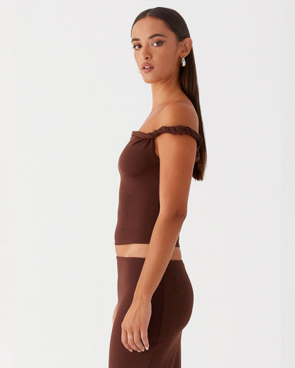 twisted-shoulder-strap-fitted-top-brown-oy1501,25010001GG52,topwear,tops,party, vacation,bold, glam, streetwear,knitted, stretchable,ribbed,brown,solid,twisted,skinny fit,fitted,regular,one shoulder,shoulder strap,sleeveless,Color: Brown coord sets,skirts,vacation,beach, glam, summer, streetwear,knitted,ribbed,brown,twisted,skinny fit,pencil skirt,full len
Fabric: Ribbed
Fit: Skinny Fit 
Length: Regular
Neck: One Shoulder
Print: Solid 
Details: Twisted shoulder strap ,TWISTED SHOULDER STRAP FITTED TOP