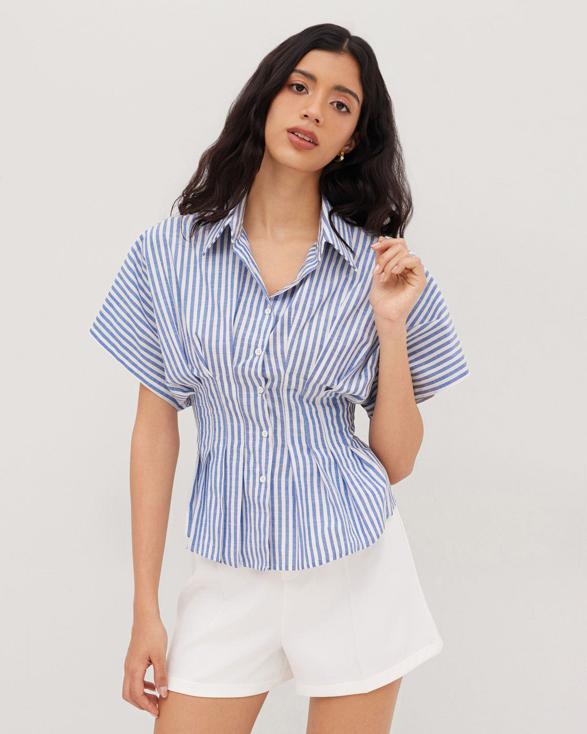 topwear,tops,casual, outdoor events,minimal, summer, streetwear,woven,linen,printed,blue,color block, pinstripes,pleated, pinstripes,button,tailored fit,fit and flare,waist length,curved hem,shirt collar,batwing sleeve,short sleeves	25060048GG,OY2016