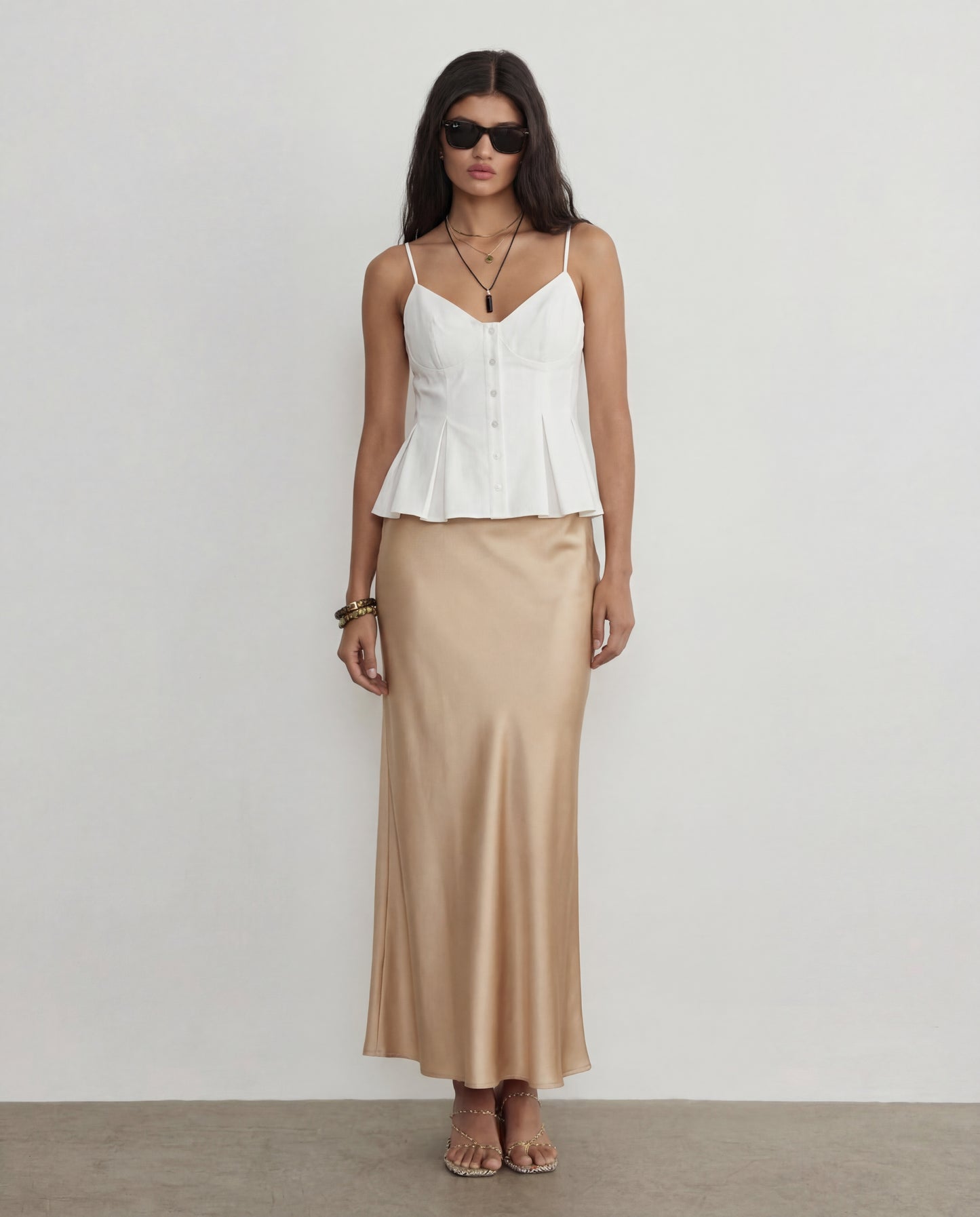 White Spaghetti Strap Peplum Top With Champagne Satin Skirt