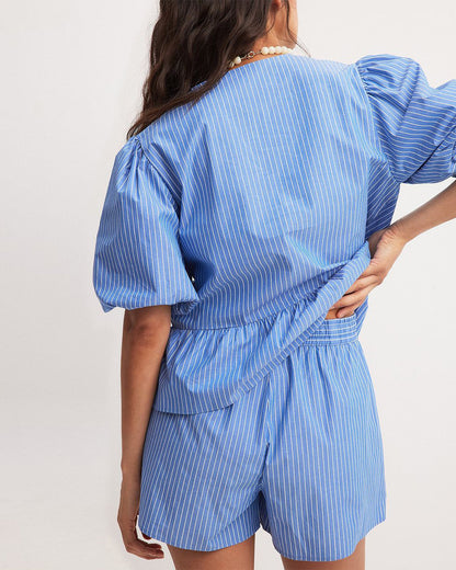 coord sets,bottomwear, topwear,casual, vacation,bold, glam, genz fit, soft girl,woven,polycotton,printed,blue,pinstripes, stripes,gathered, pinstripes, tie knot,drawstring,regular fit top,tie up top,waist length top,flared hem,round neck,puff sleeves,elbow length sleeves,shorts,mini shorts,mini,straight hem,mid rise waist,25060047GG, OY2015