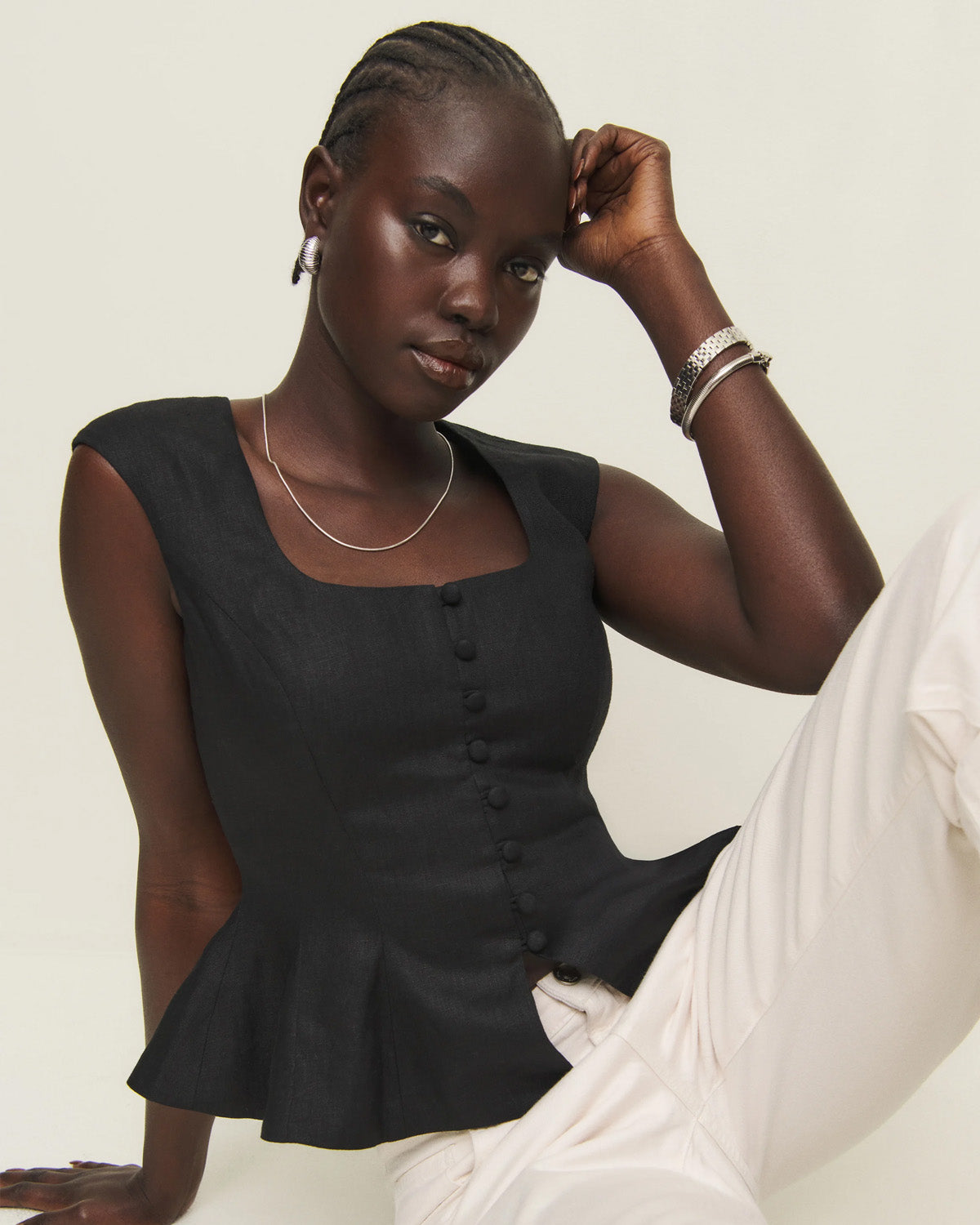 topwear,tops,semi-formal, vacation, outdoor events,minimal, sophisticated, summer,woven,cotton,black,solid,flounce,button,slim fit,peplum,waist length,flounce hem,square neck,shoulder strap,sleeveless, OY1909, 25060009GG