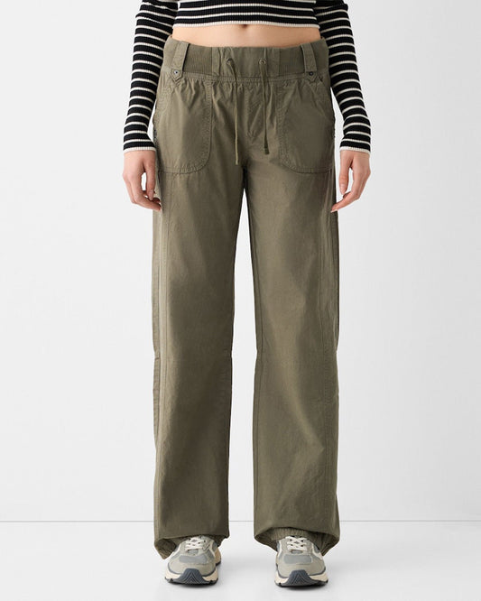 bottomwear,trousers,casual,streetwear,woven,cotton,olive,patch pocket,straight fit,straight,full length,mid rise,ribbed-waist-straight-fit-trouser-olive,Color: Olive
Fabric: Cotton
Fit: Straight Fit 
Length: Full Length
Waist: Mid Rise
Closure: Drawstring
No. of Pockets: 4
Print: Solid
Details: Features a high-rise elastic waistband with an adjustable drawstring for a comfortable, customizable fit.,RIBBED WAIST STRAIGHT FIT TROUSER