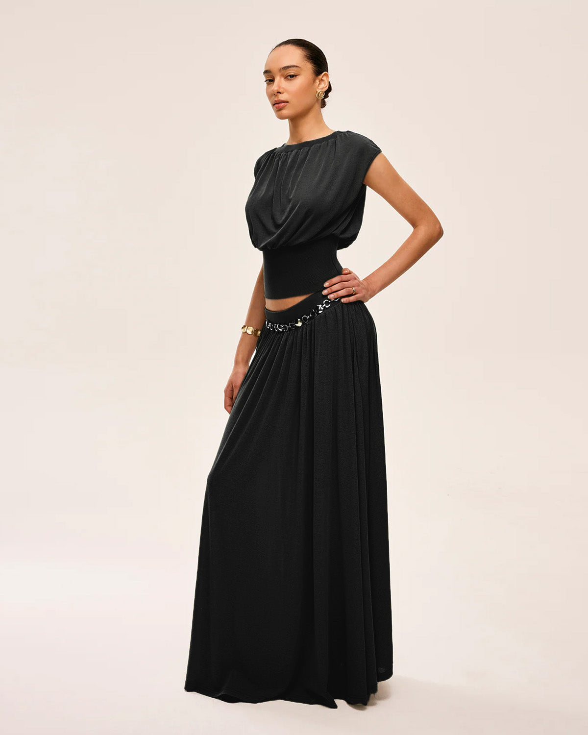 coord sets,bottomwear, topwear,casual chic, vacation, outdoor events, minimal, summer, urban fit, ,knitted,crepe,gathers,black,solid,fabric gathers,,,slim fit top,waist fitted top,waist length top,straight hem,crew neck,no straps ,short sleeves,cap sleeves,slip on,skirts,flare  skirt,full length,straight hem,mid rise waist,no pockets,OY3061, 25070030GG