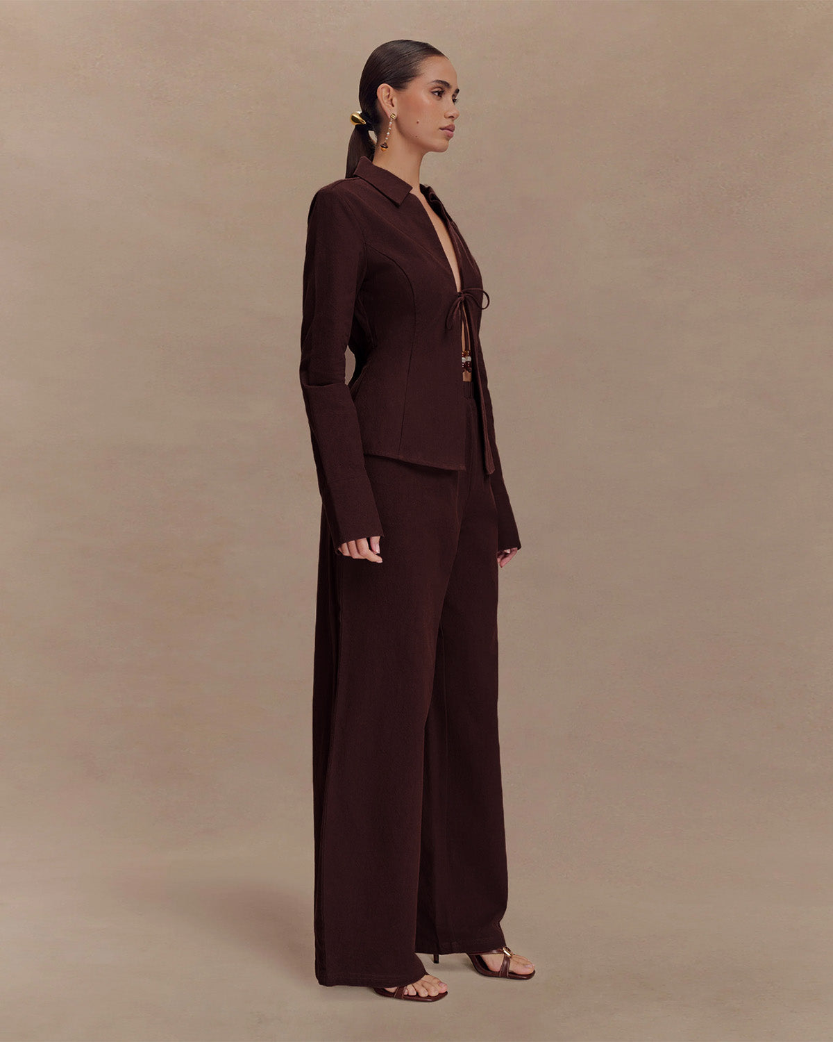 coord sets,bottomwear, topwear,casual chic, outddoors, vacation, lunch date, summer,urban fit, genz, minimal,woven,cotton,,,dark brown,solid,,,beads,regular fit top,front slit top,longline top,straight hem,lapel collar,no straps,long sleeves,full sleeves,tie up top,pants,wide leg pants,full length,straight hem,mid rise waist,side pockets, OY3052, 25070023GG