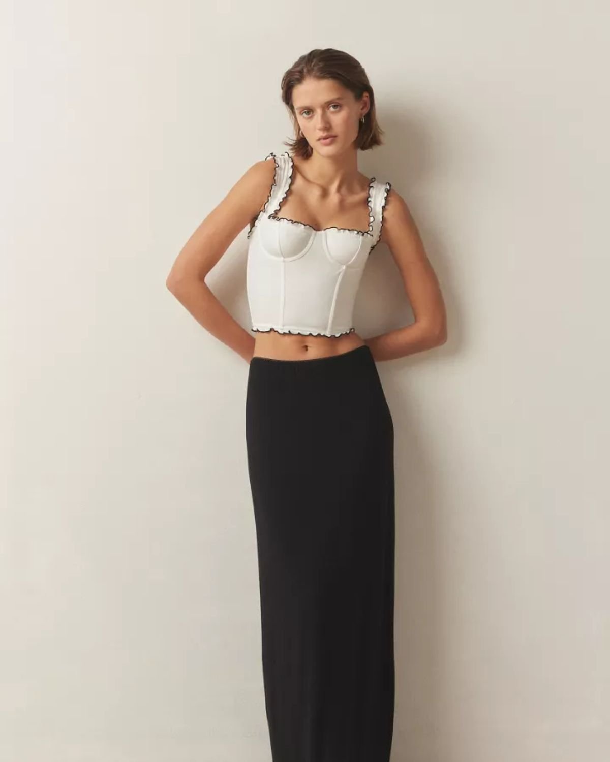 lettuce-edge-crop-top,RUFFLED WHITE CROP TOP,topwear,tops,casual,soft girl,knitted,ribbed,white,solid,contrast,slim fit,crop,crop,lettuce,square neck,shoulder strap,sleeveless