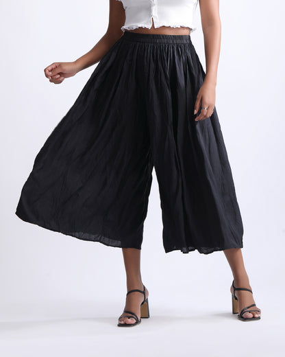 HIGH RISE FLARED TROUSER,black, bottomwear, calf length, casual, crinkled, high rise, palazzos, relaxed fit, straight fit, summer, trousers, woven,high-rise-flared-trouser-black,Color- Black
Fabric- Viscose
Type- Palazzo
Fit- Flared
Length- Calf Length
Waist- High Rise
Print- Solid
Details- Crinkled