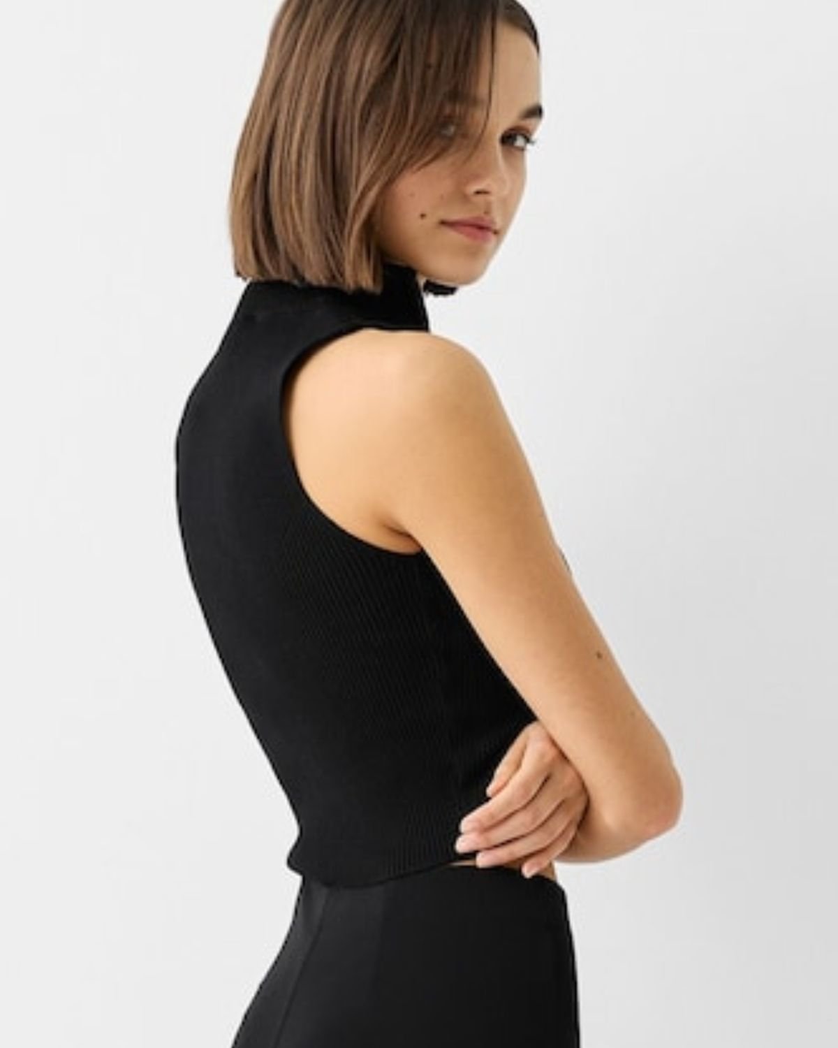 zip-up-fitted-top,ZIP-UP FITTED TOP,topwear,tops,casual,streetwear,knitted,ribbed,black,solid,zipper,slim fit,fitted,regular,high neck,sleeveless