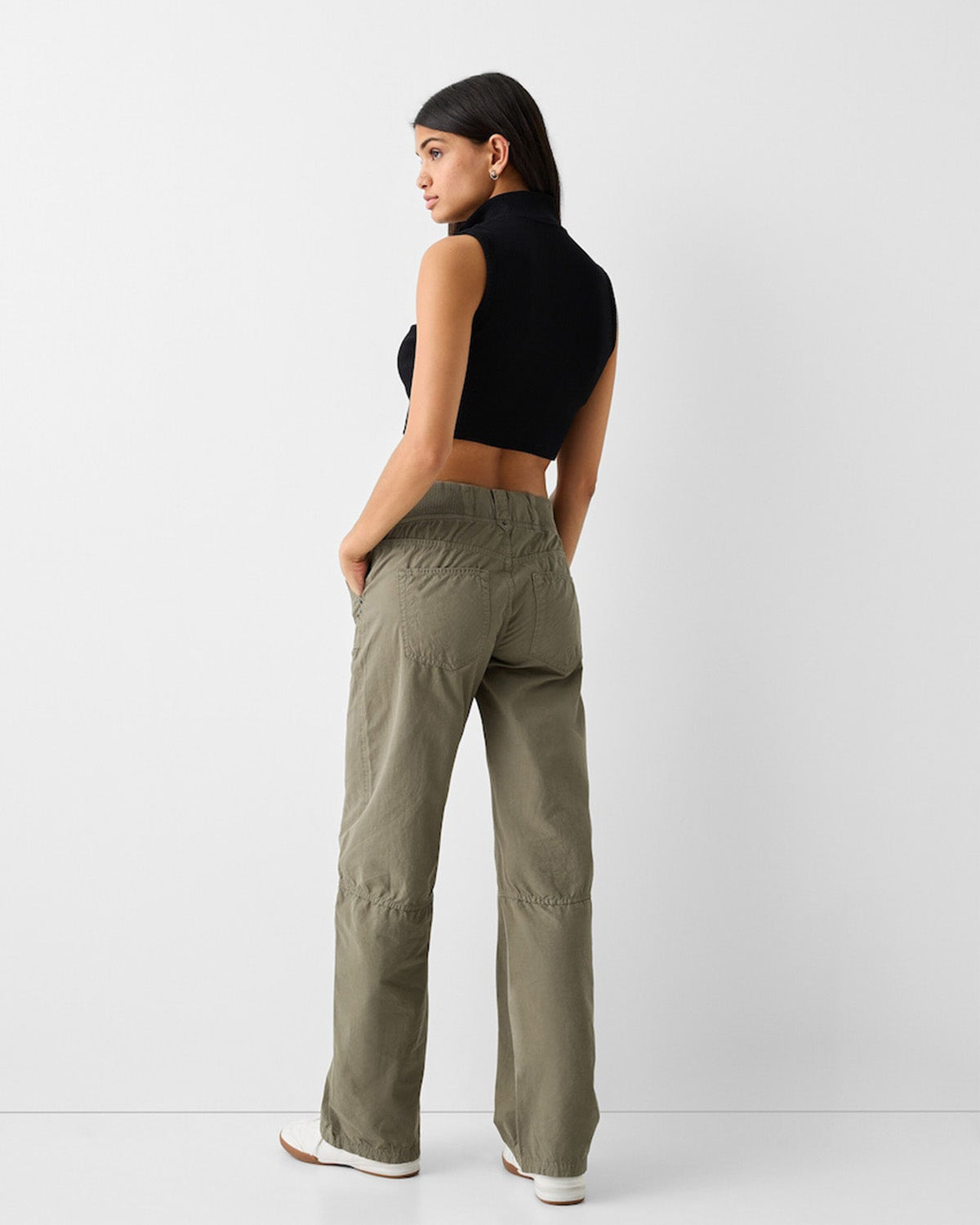 bottomwear,trousers,casual,streetwear,woven,cotton,olive,patch pocket,straight fit,straight,full length,mid rise,ribbed-waist-straight-fit-trouser-olive,Color: Olive
Fabric: Cotton
Fit: Straight Fit 
Length: Full Length
Waist: Mid Rise
Closure: Drawstring
No. of Pockets: 4
Print: Solid
Details: Features a high-rise elastic waistband with an adjustable drawstring for a comfortable, customizable fit.,RIBBED WAIST STRAIGHT FIT TROUSER