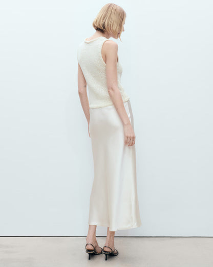 bottomwear,skirts,casual chic, outdoor events, party,glam, summer, urban fit, vintage,woven,satin,white,zipper,skinny fit,a-line skirt,maxi,a-line,mid rise	25070010GG, OY2083