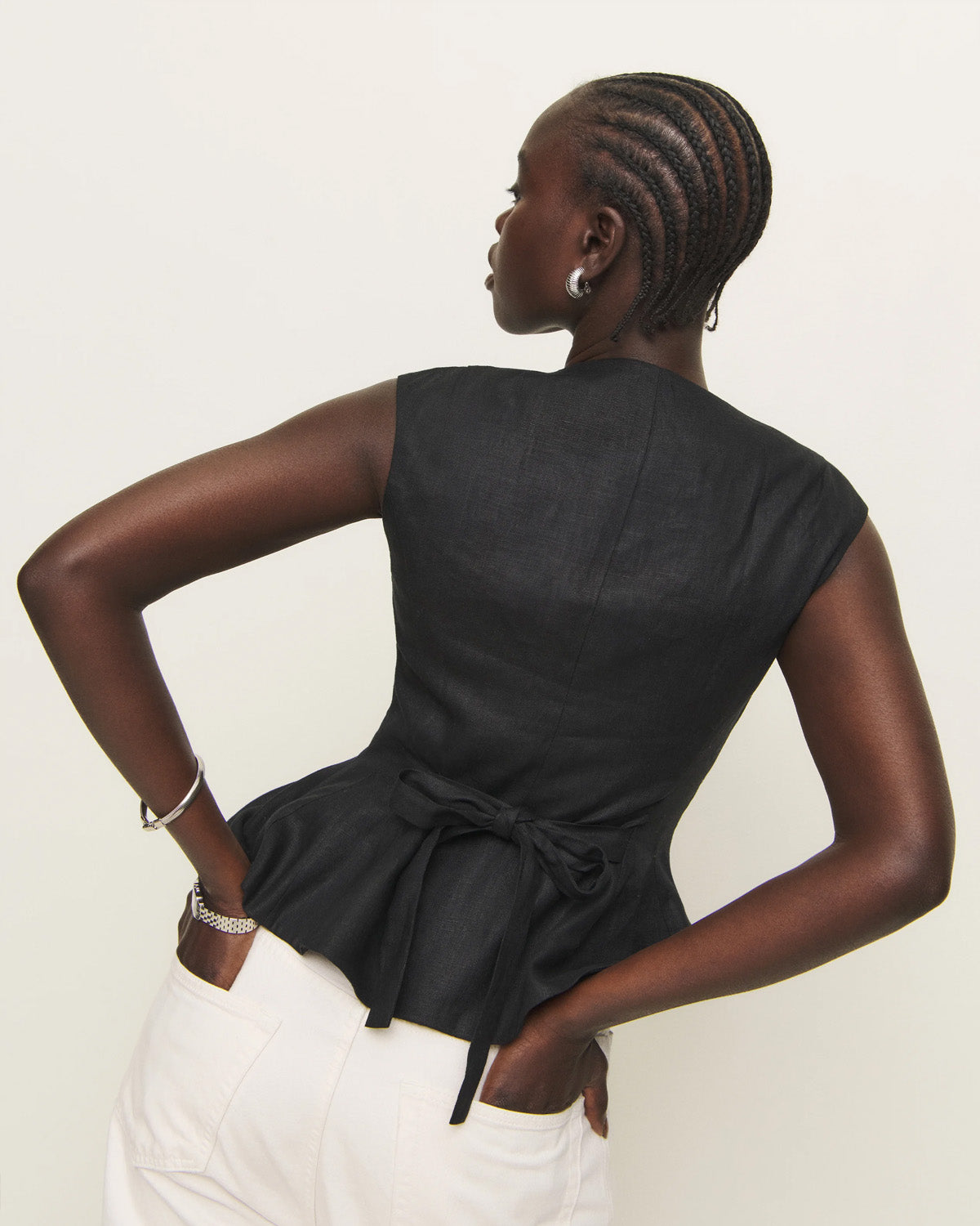 topwear,tops,semi-formal, vacation, outdoor events,minimal, sophisticated, summer,woven,cotton,black,solid,flounce,button,slim fit,peplum,waist length,flounce hem,square neck,shoulder strap,sleeveless, OY1909, 25060009GG