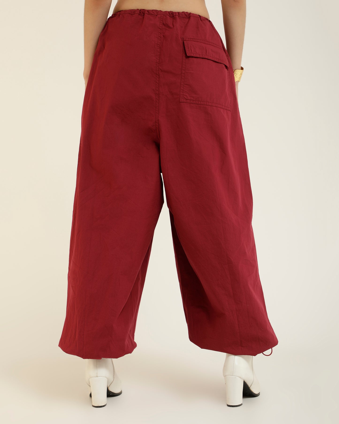 ADJUSTABLE SLIDER PARACHUTE PANTS,adjustable strap, adjustable waist, bottomwear, cotton, drawstring, full length, high rise, high waist, maroon, new drop april 24, pants, parachutes, trousers,parachute-adjustable-slider-trouser,Length - Full length Waist - High-rise waist Fit - Regular fit Color - MaroonNo. of Pockets - 2Material - Cotton Length - 40"Closure - Zip &amp; hook Detail - Adjustable sliders