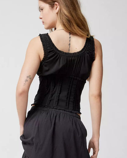 ruffled-corset-top-black,RUFFLED CORSET TOP,Color: Black
Fabric: Cotton, Polyester
Fit: Slim Fit 
Length: Regular
Neck: V-Neck 
Sleeves: Sleeveless
Closure: Hook & Eye
Print: Solid
Details: Ruffle Detailing,topwear,tops,casual,soft girl,stretchable, woven,cotton, polyester,black,solid,ruffled,slim fit,corset,regular,v-neck,sleeveless