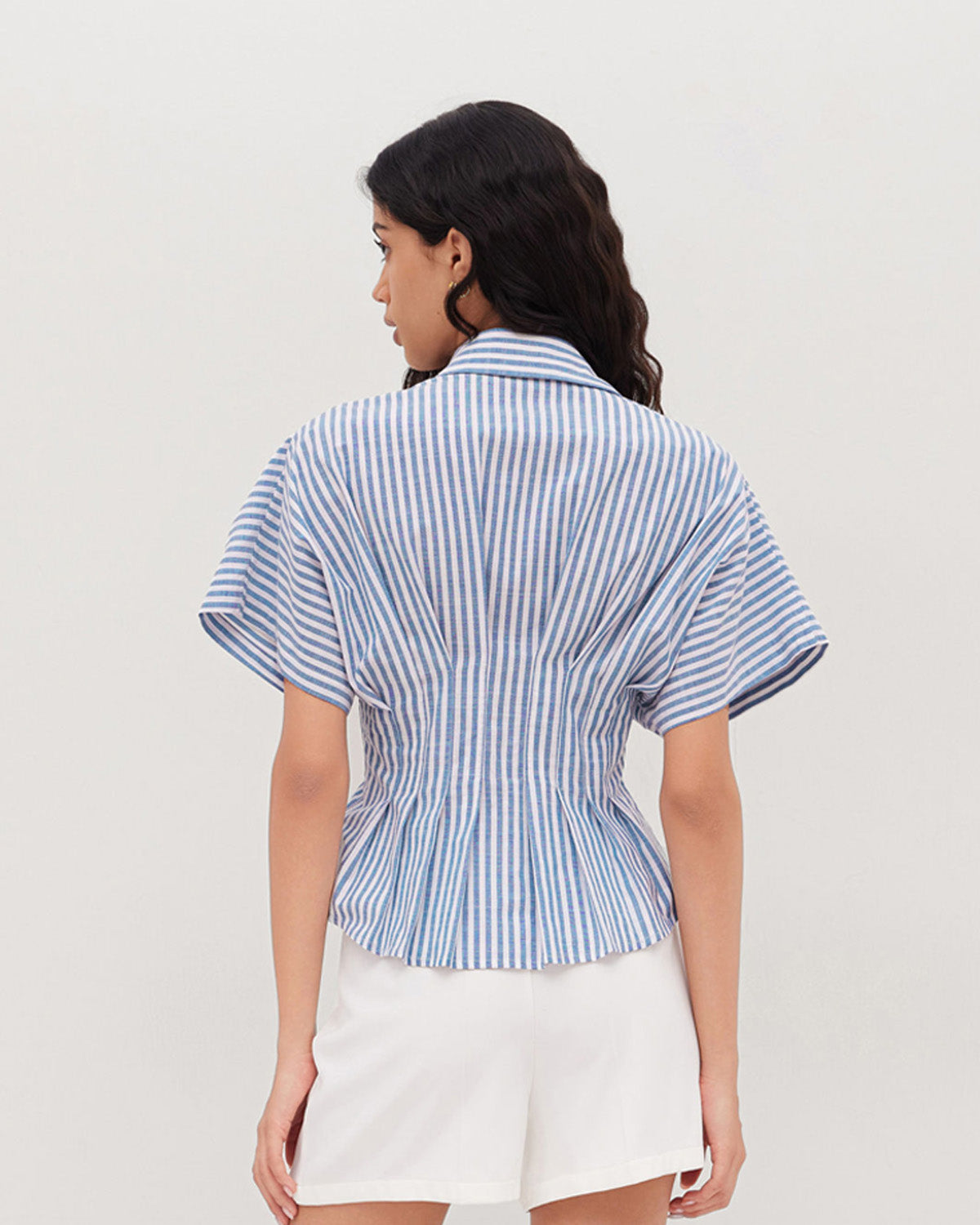 topwear,tops,casual, outdoor events,minimal, summer, streetwear,woven,linen,printed,blue,color block, pinstripes,pleated, pinstripes,button,tailored fit,fit and flare,waist length,curved hem,shirt collar,batwing sleeve,short sleeves	25060048GG,OY2016