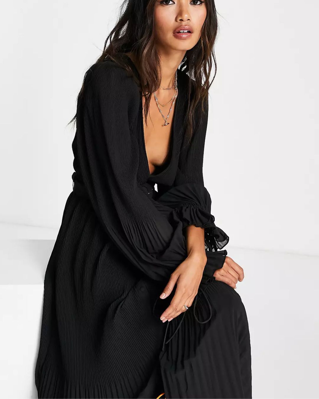 pleated-midi-dress-black,PLEATED MIDI DRESS,Color: Black
Fabric: Georgette
Type: A-Line
Fit: Regular Fit
Length: Midi
Neck: Plunge Neckline
Sleeve: Bishop Sleeve
Closure: Button
Trims: Belt
Print: Solid
Details: Pleated Fabric,dresses,dresses,party,glam,woven,georgette,black,solid,pleated,belt,regular fit,a line,midi,plunge neckline,bishop sleeves,long sleeves,deep back
