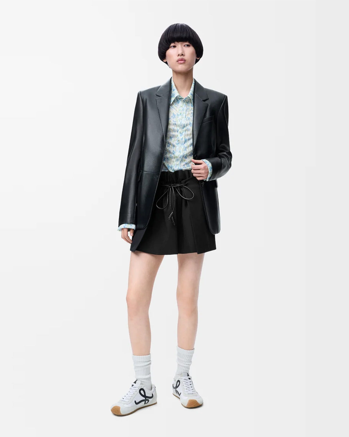 bottomwear,skirts,casual chic, vacation,gen z, glam, summer, streetwear,woven,cotton twill,panelling,black,panelled, tie knot,drawstring,relaxed fit,mini skirt,mini,flared,mid rise, 25080011GG, OY2172